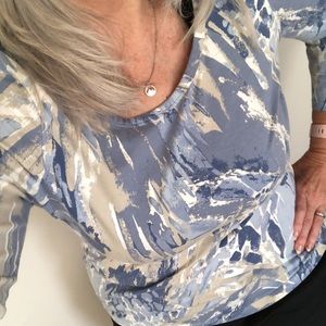 Blue and gray T